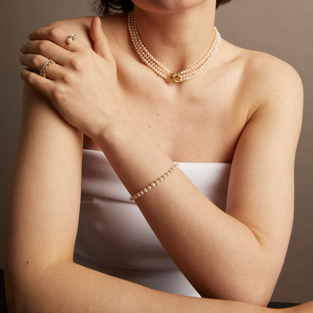Aurate x Marilyn Monroe: Gold Knot Pearl Bracelet